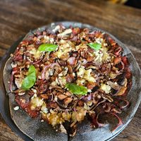 It's possible to change the sour dough to black crust at Black Crust Pizzeria in Vik