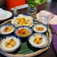 Steamed Rice Cakes
Banh Bèo - Bánh Dúc 85
Coconut-rice batter steamed & garnished with peanuts & fried onions, served w/our House sauce.
 at Shamballa Vegetarian Bistro HoiAn in Hoi An