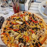 Vegan pizza and lavender tonic 😍 at La Conac in Alba Iulia