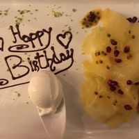 Ananas cappacio with coconut ice cream at Cantina don Camillo in Basel