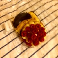 The photo does NOT represent how beautiful those cakes are - I dragged them across the city in heat😒it's a pistachio and raspberries tart and some sort of a custard cake with cr at Gluten-free Bakery in Yerevan