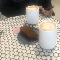 Lattes with signature almond macadamia milk and vegan molasses kabocha loaf  at Bird & Branch in New York City