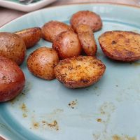 Fried potatoes with herbs at Bojtorina Vegan Kitchen in Sopron