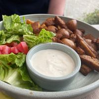 Homemade seitan gyros with spicy potatoes  at Bojtorina Vegan Kitchen in Sopron