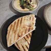 White bean spread, chilli, garlic, pitta! Couldn’t stop myself from diving in before taking the pic!  at Tendril in London