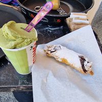 Large pistachio granite with chocolate cannoli, both vegan at Bar Mazzini in Catania