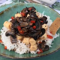 “Chicken” - Rice… very bland.. no flavor or spices… “chicken” was too tiny bits. Lacking sauce.  at Yes It Is Vegan II - Liszt Ferenc Tér in Budapest