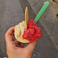 Pistachio and raspberry ice cream at Gelateria Paniko in Lucca