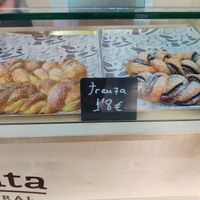 Braided pastries with cream or chocolate at La Revuelta in Granada