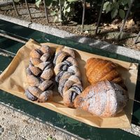 breaded chocolate breads 1.9€ chocolate croissant 1.8€ and nature croissant 1.3€  at La Revuelta in Granada