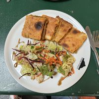 Vegan börek (with potatoes) + salad  at CHI Koefte - Markthalle in Basel