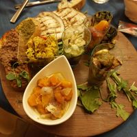 Antipasto misto con caponata di zucca e cipolle, cous cous; bruschette e altre verdure at La Trinacria Ristorante Trattoria Pizzeria in Enna