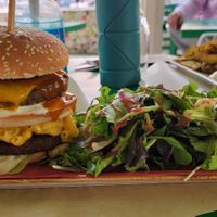 Mac and cheese burger w salad at Athens Vegan Burgers in Athens