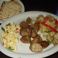 Italian Sausage, Peppers & Onions
Home Fries, Flat Bread & Grits (with some bonus tofu scramble). at Jayyid Harvest in Harrisburg
