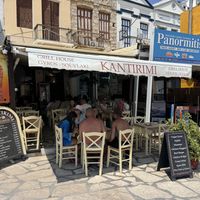 Outside - note available tables for 2 - refused to seat me   at Kantirimi Grill House in Symi