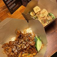 Mock chicken box meal with side order of tofu   at Salt & Pepper in Manchester