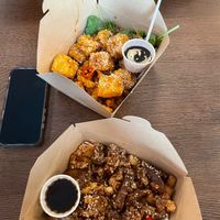 I got the mock chicken box and my friend got the tofu box. Both amazing! at Salt & Pepper in Manchester