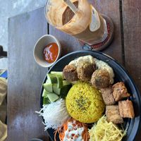 Chickpea Turmeric Rice bowl and Choco lover shake(Banana, peanut, coconut, cacao)  at Chickpea Eatery Thuan Chay in Hoi An