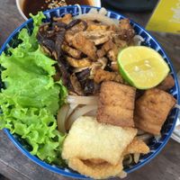 Brown noodle bowl  at Chickpea Eatery Thuan Chay in Hoi An