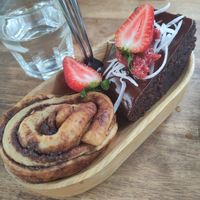 Cinnamon roll and chocolate cake at Chickpea Eatery Thuan Chay in Hoi An
