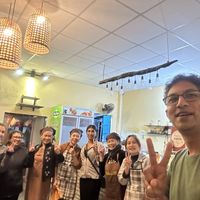 Friendly staff happy to take picture with us  at Chickpea Eatery Thuan Chay in Hoi An