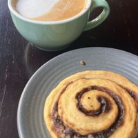 Cappuccino and cinnamon roll  at Chickpea Eatery Thuan Chay in Hoi An