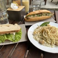 Cheese sandwich, Alfredo pasta, and tempeh banh mi sandwich! So delicious!  at Chickpea Eatery Thuan Chay in Hoi An