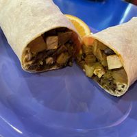 Breakfast burrito w green sauce. Green or red Chile sauce option.   at Strictly Organic in Bend