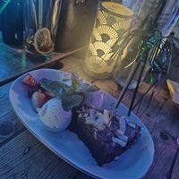 Chocolate cake with vanilla ice-cream and fruit. at Koh Phangan in Stockholm
