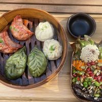 Mix momo and lil veggie bowl   at Bodja in Brussels
