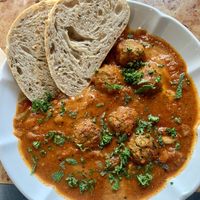 Shakshouka with veggie balls. Incredible delicious!  at Rooted 루티드 in Seoul