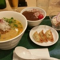 L-R: seasonal ramen, mini curry rice, gyoza, extra veggies for the ramen, chilli powder. at T's Tantan - Tokyo JR Station in Tokyo