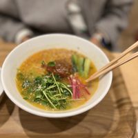 Golden ramen bowl  at T's Tantan - Tokyo JR Station in Tokyo
