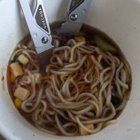 Hot and sour instant noodle pot at T's Tantan - Tokyo JR Station in Tokyo