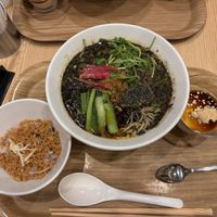 Black sesame ramen with rice and yoghurt sides  at T's Tantan - Tokyo JR Station in Tokyo