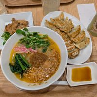 Golden sesame ramen with gyozas and soy meat plus a lemon drink at T's Tantan - Tokyo JR Station in Tokyo