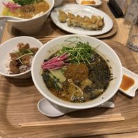 Black sesame Ramen, Soy meat on rice, Gyozas, Golden Sesame Ramen  at T's Tantan - Tokyo JR Station in Tokyo