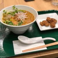 Golden sesame ramen and fried soy meat at T's Tantan - Tokyo JR Station in Tokyo