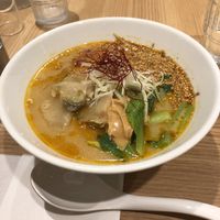 Ramen with peanut butter + sesame seeds + veggies + spicy. Not gluten free. at T's Tantan - Tokyo JR Station in Tokyo