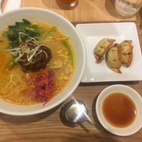 White-sesame ramen with gyoza at T's Tantan - Tokyo JR Station in Tokyo
