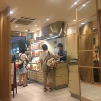Counter with takeaway cup noodles and stock etc at T's Tantan - Tokyo JR Station in Tokyo