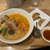 Golden sesame ramen with gyoza  at T's Tantan - Tokyo JR Station in Tokyo