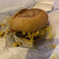 Bacon Mac and cheese burger ready to be annihilated  at Arlo's Food Truck - Cheerup Charlie's in Austin