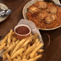 Chips, paella  at Lazy Farmers in Seoul