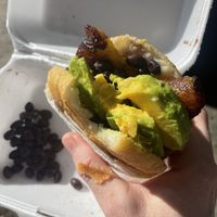 Vegano arepa - fresh fried arepa with black beans, avocado and fried plantain, come with a creamy sauce on the side (aoli?) SO good!  at Los Chamos Arepas in Carolina