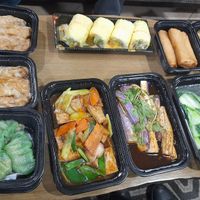 Clockwise from top left: Bean Curd Rolls, Mango Lover Rolls, Veggie Spring Rolls, Veggie Fried Rice, Yau Choy, Eggplant, Tofu Stir Fry, and Mushroom Dumplings at Red Ginger Dimsum & Tapas in Asheville