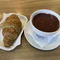 Strawberry marmalade croissant and soy milk hot cocoa   at Nonna Pallina Pasticceria Gelateria Artigianale in Palmanova