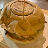 Panino vegano con hummus di ceci, lampascioni, melanzane, pomodori secchi  at Drogheria Pugliese in Ostuni