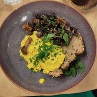 Tofu scramble with truffle mushrooms, sourdough bread and fresh spinach at Bonjo in Paris