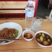 Japanese curry, kimchi, and noodles and patty. at YinYin Vegan in Khon Kaen